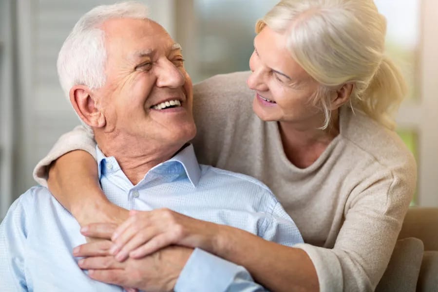A happy elderly couple enjoying a moment together