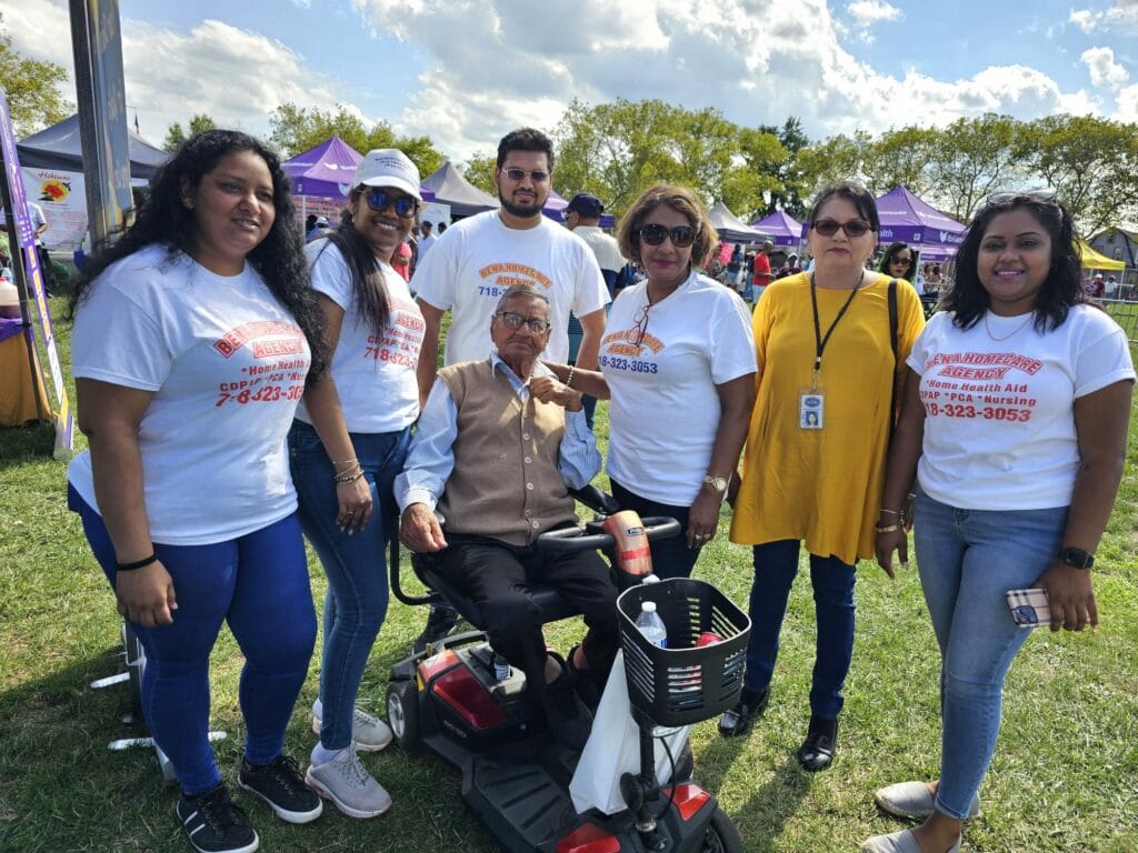 Group of staff and resident at an outdoor event