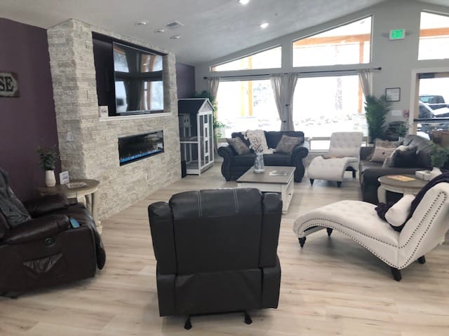 Common area with comfortable seating and a fireplace