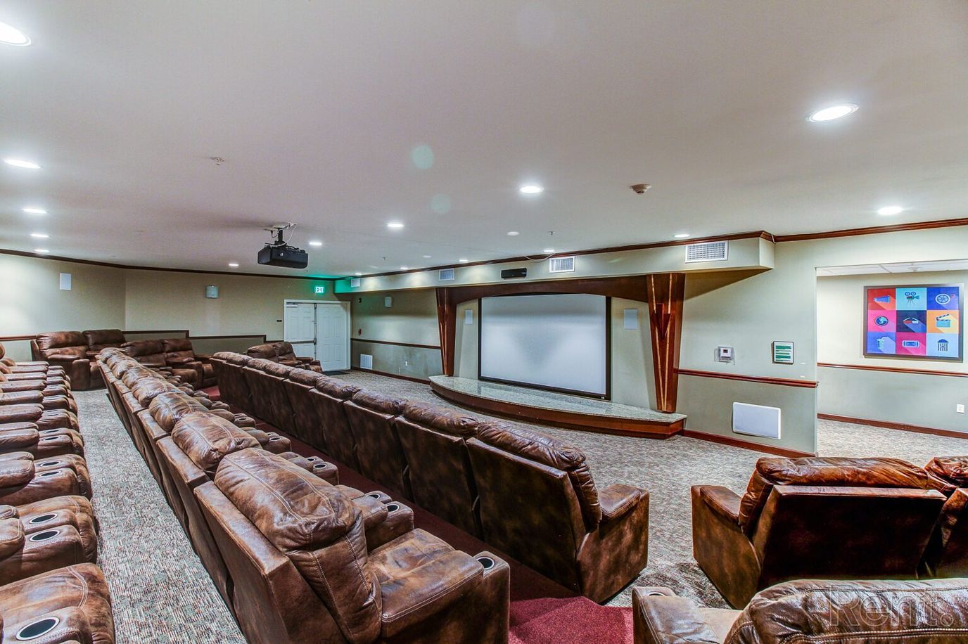 Interior of a cozy movie room with reclining seats