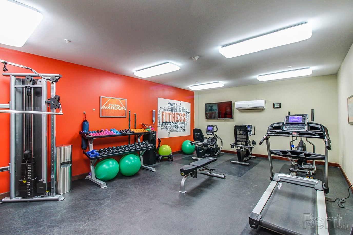 Interior fitness room with exercise equipment