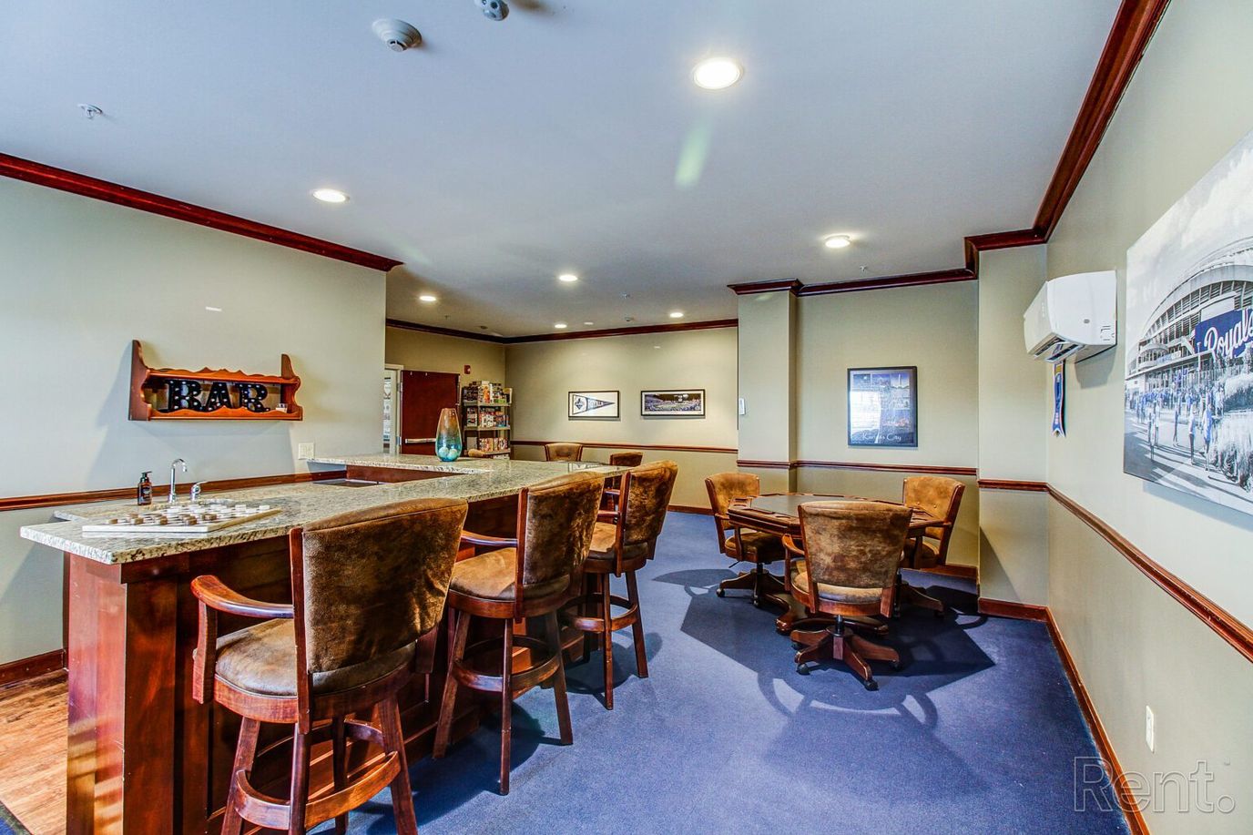 Interior view of a lounge area with seating and bar