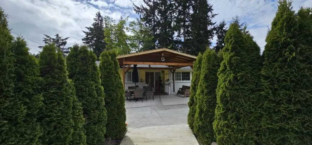 Entrance to Greenhaven Senior Care with greenery