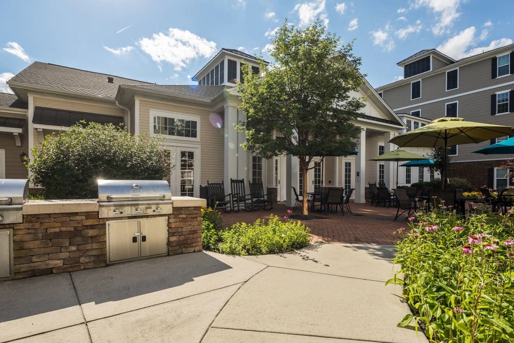 Outdoor patio with seating and barbecue grills