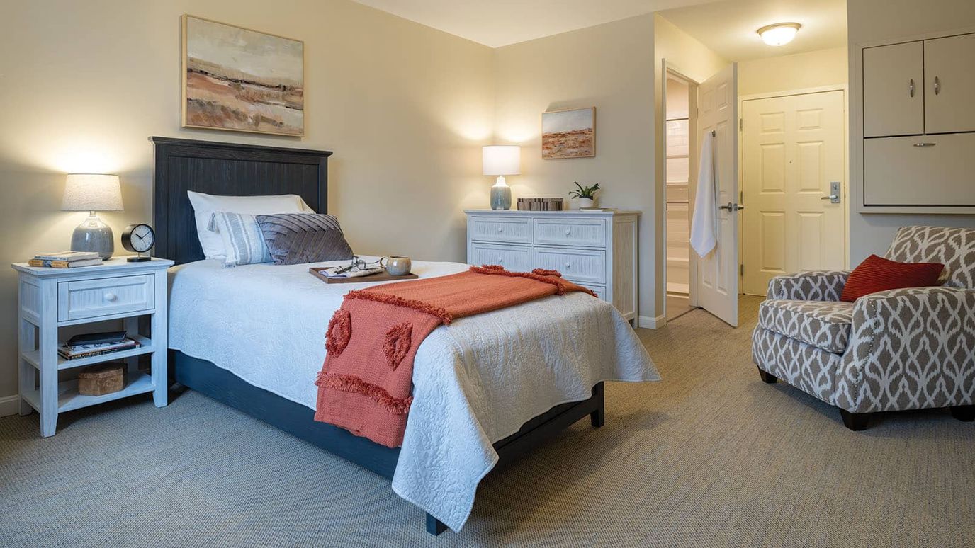 Cozy private resident room with bedding and decor