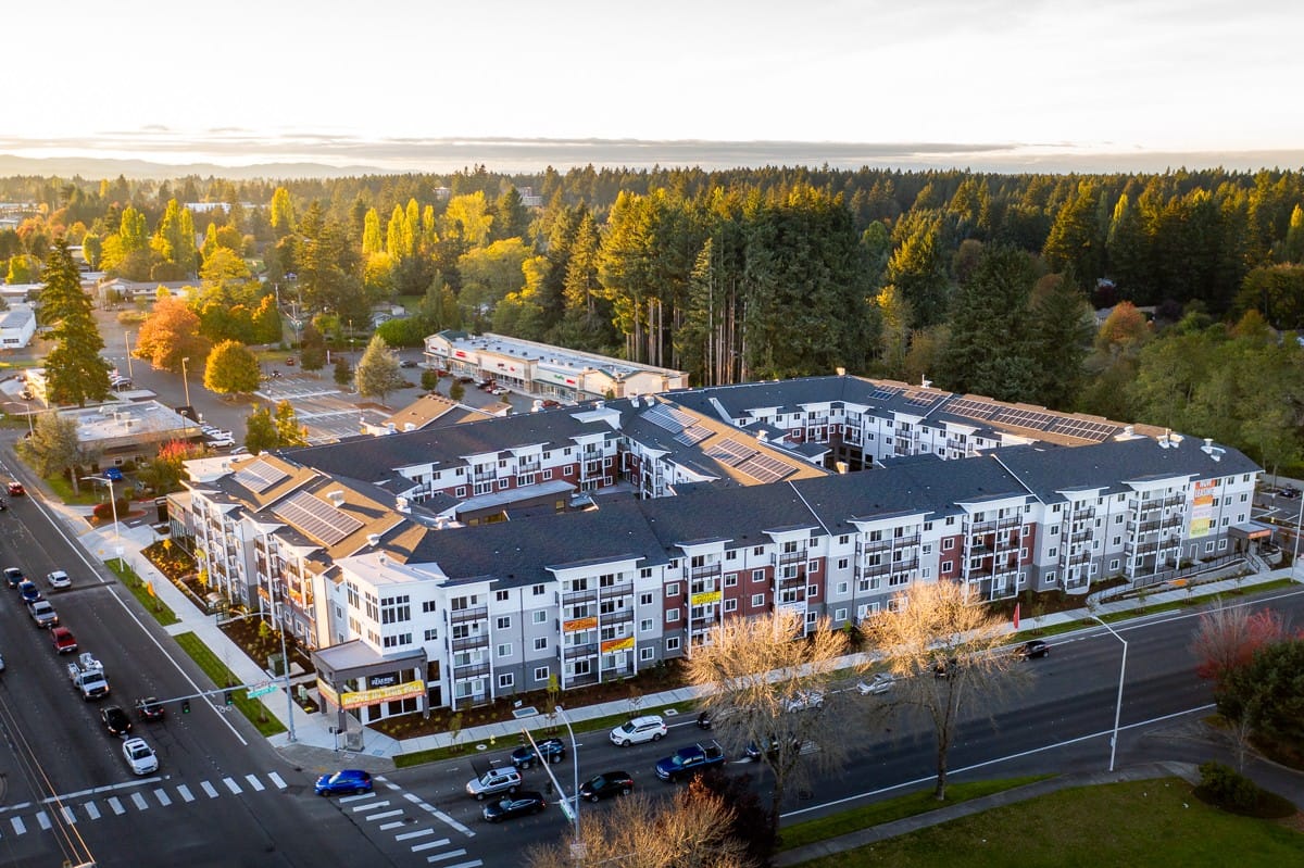 Aerial view of a senior living facility surrounded by trees