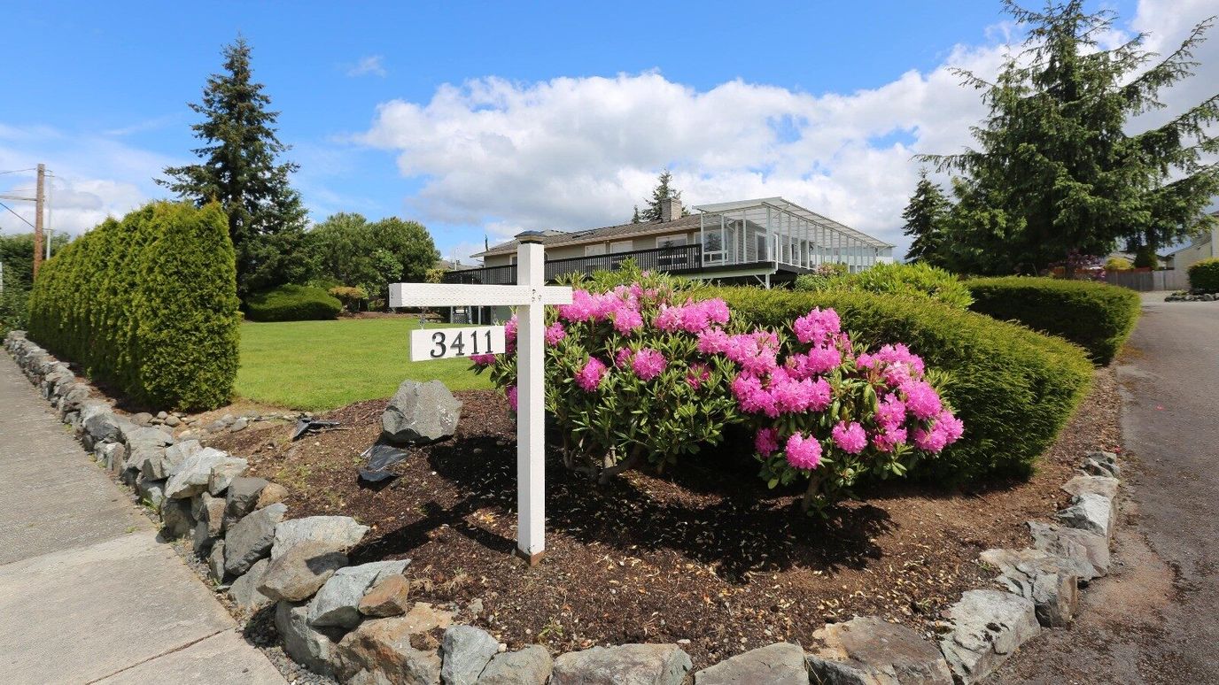Exterior view of a building with landscaping and flowers
