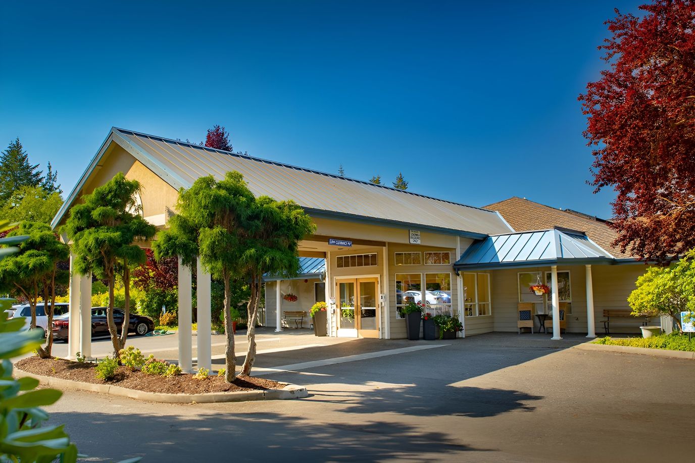 Entrance of Clearbrook Inn with landscaped area
