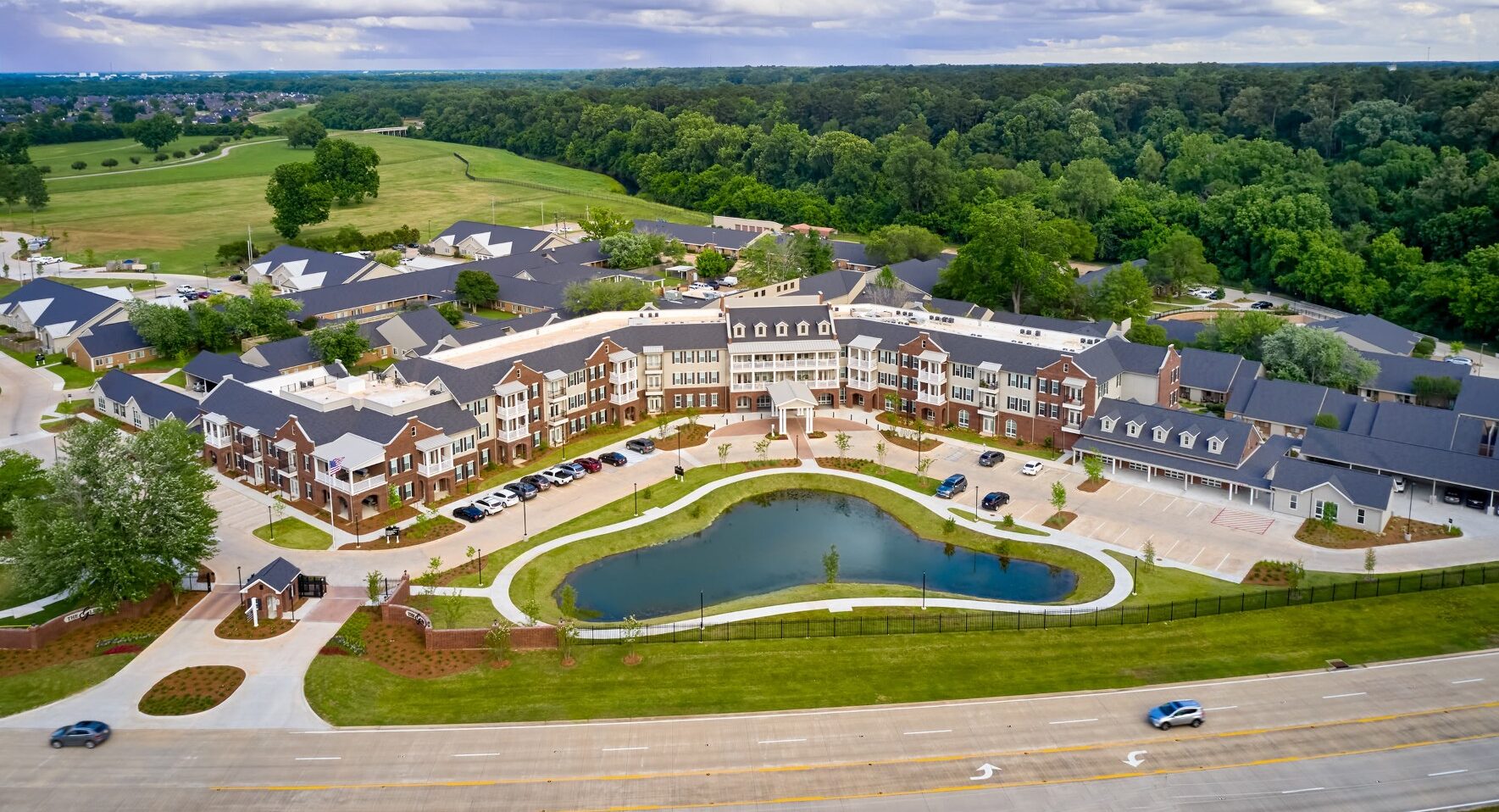Aerial view of the retirement community with landscaped areas