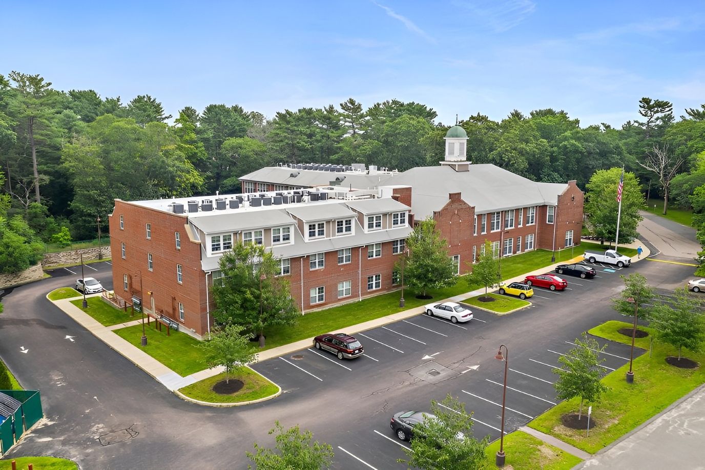 Aerial view of Fulton School Residences building and parking area