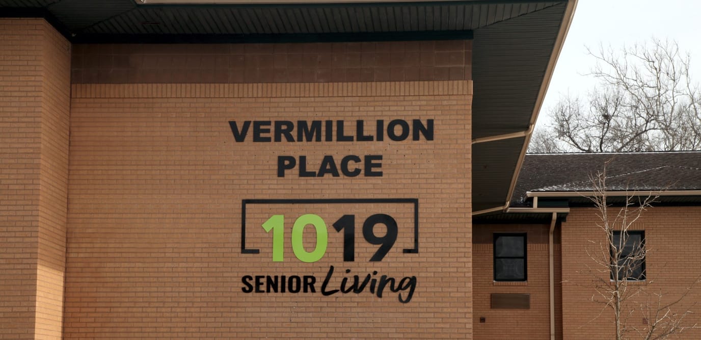 Facility logo on the exterior wall