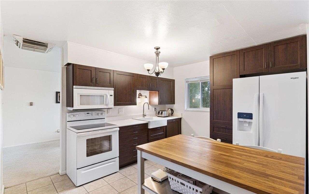 Bright kitchen area with modern appliances