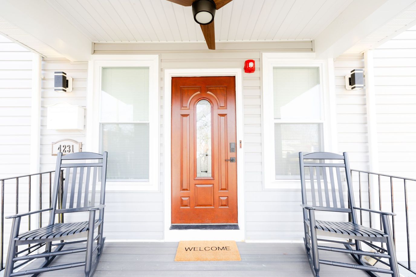 Front entrance of the assisted living facility with welcome mat