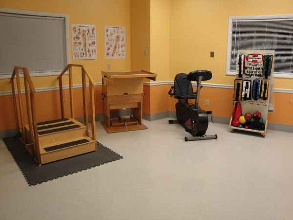 Rehabilitation equipment in a bright therapy room