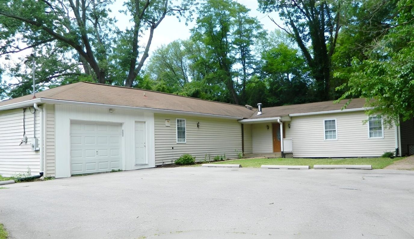 Exterior view of a single-story nursing home building