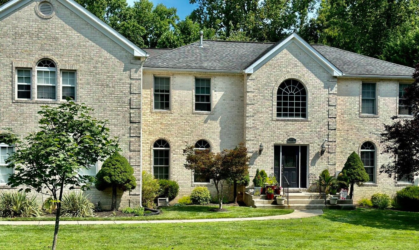 Exterior view of a senior living facility with landscaping