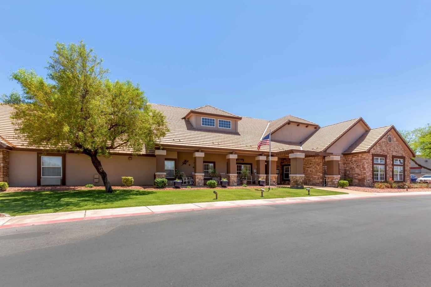 Front view of the assisted living facility with landscaping
