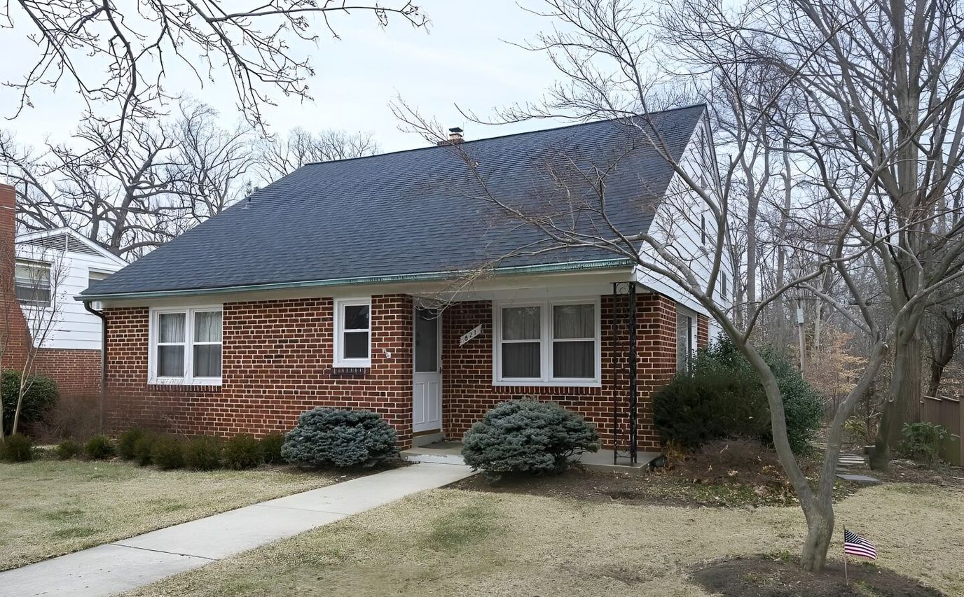 Exterior view of a single-story brick house
