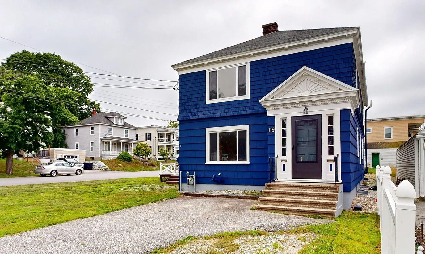 Exterior view of a blue two-story building