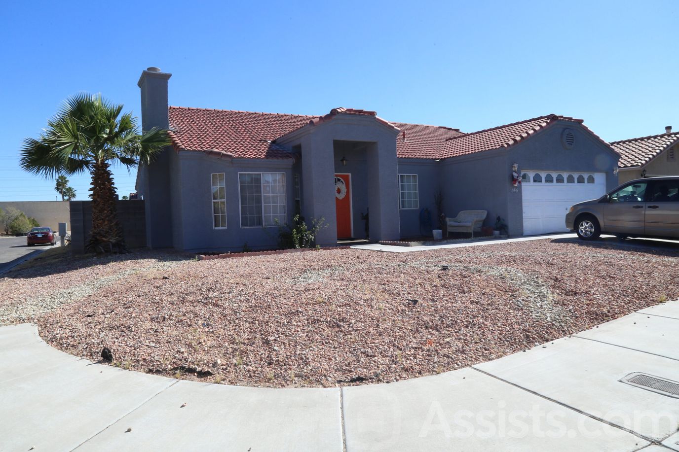 Ross Senior Residence, assisted living in Las Vegas, NV — Single-story residential building with a landscaped front yard