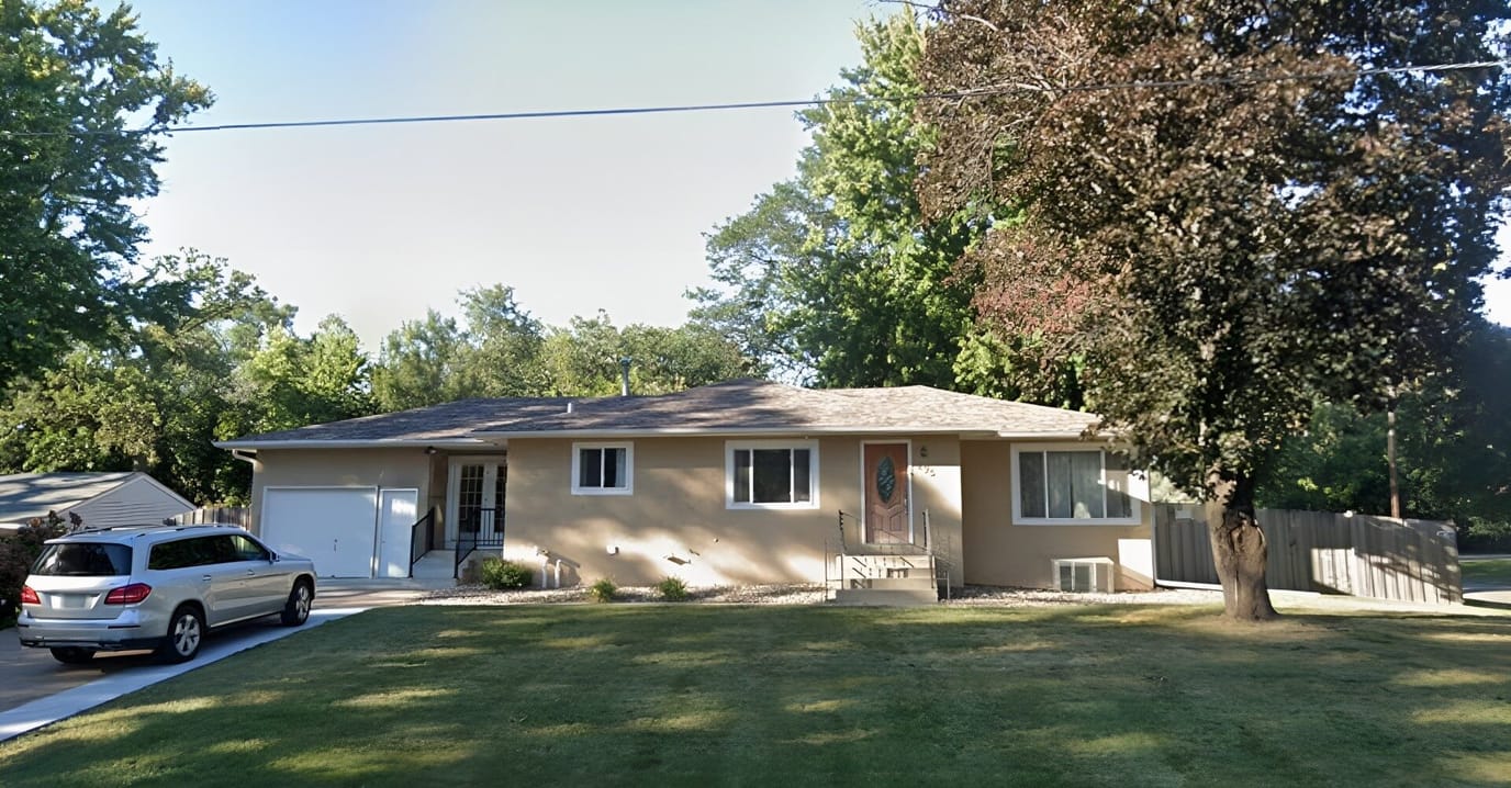 Exterior view of a single-story facility building