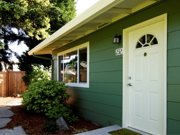 Exterior view of a green facility building.