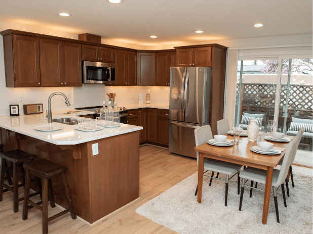 Modern kitchen and dining area in assisted living facility