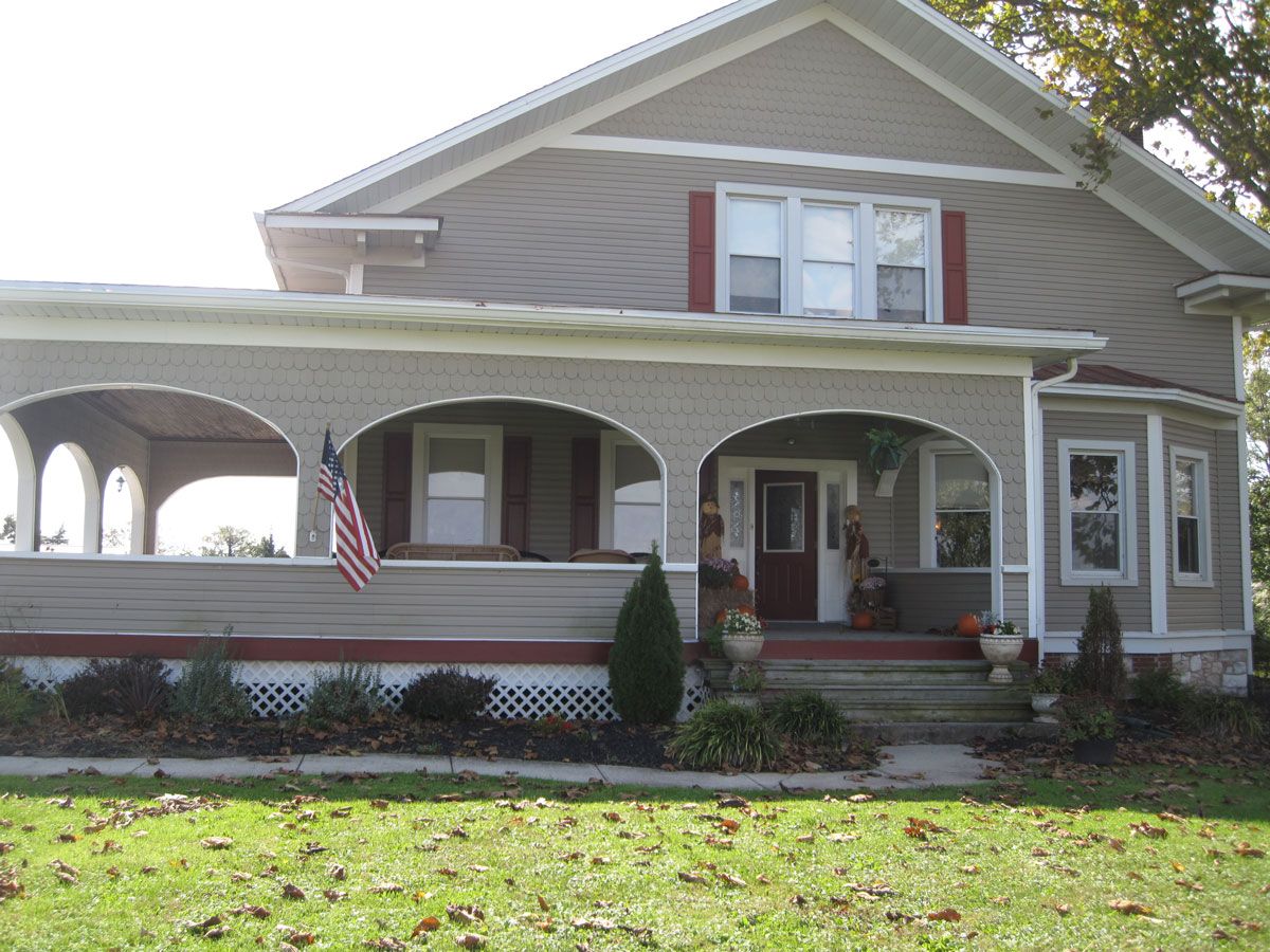 Exterior view of assisted living facility with porch