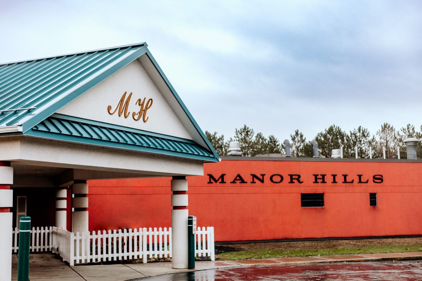 Exterior view of Manor Hills entrance and building