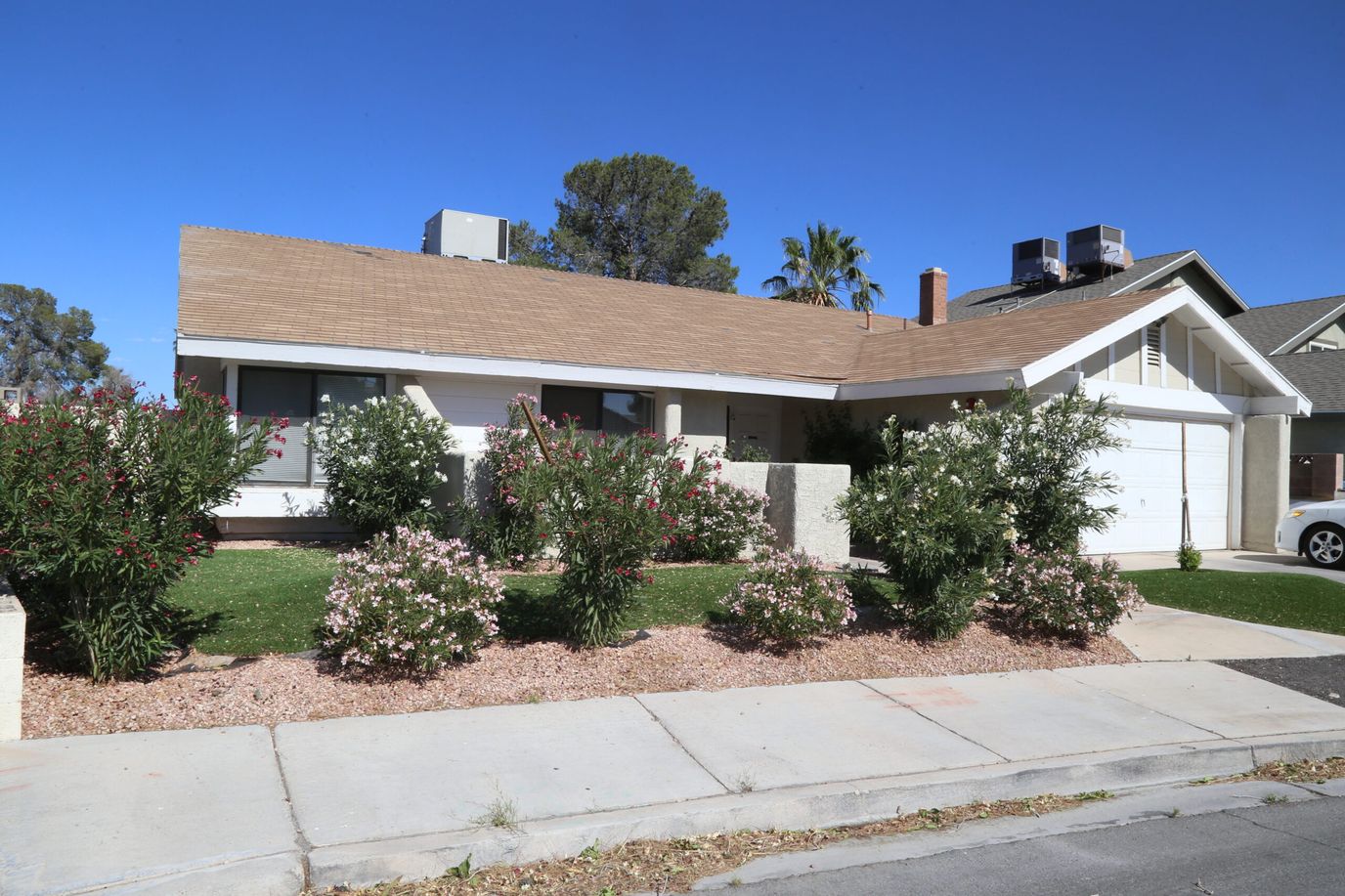 Exterior view of a residential facility with landscaping.