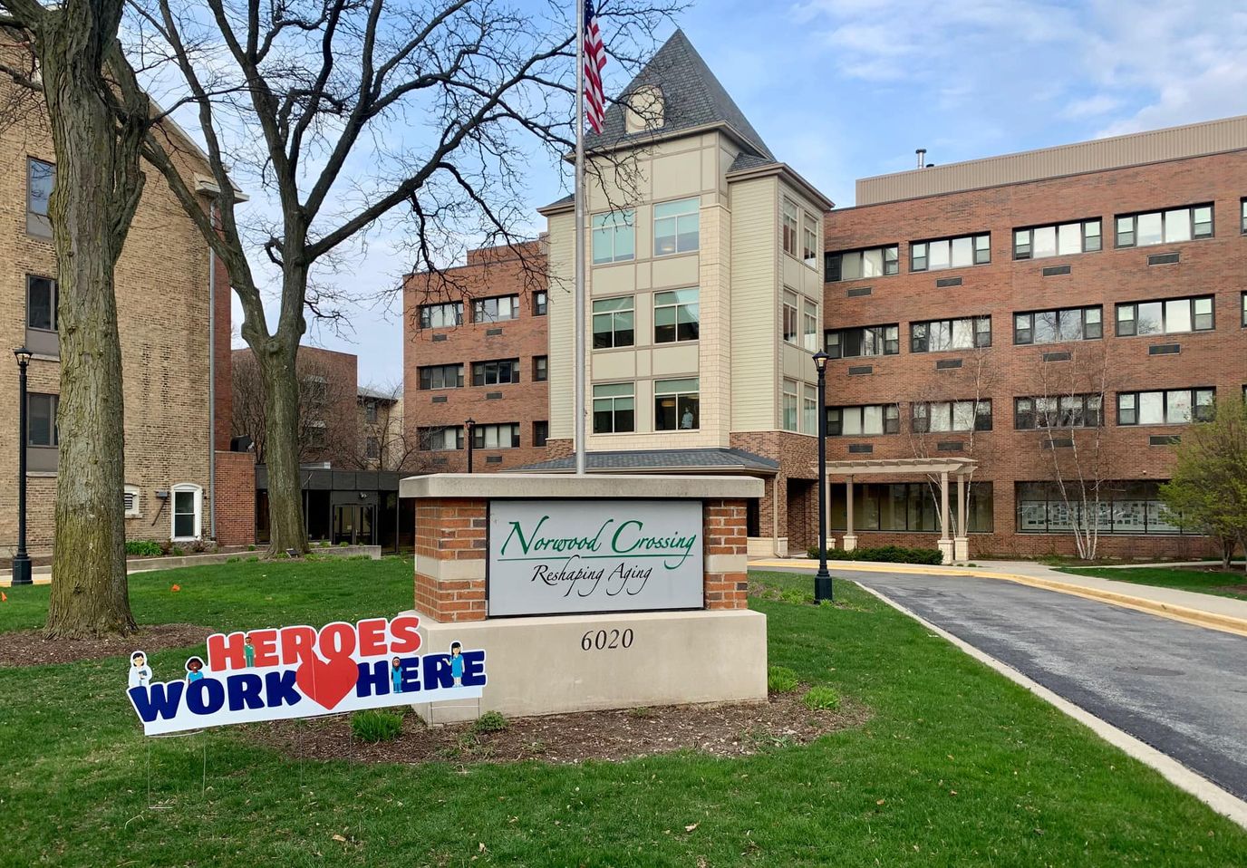 Building exterior of Norwood Crossing with signage