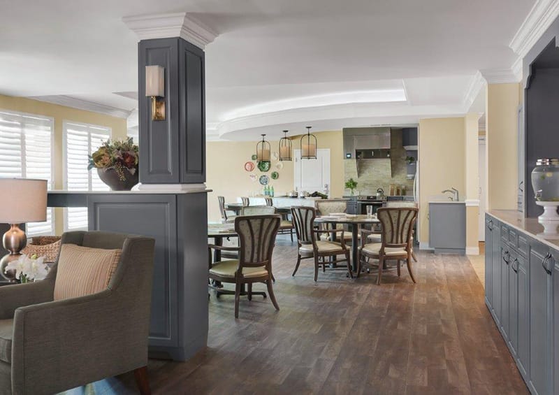 Bright common area with dining and lounge space
