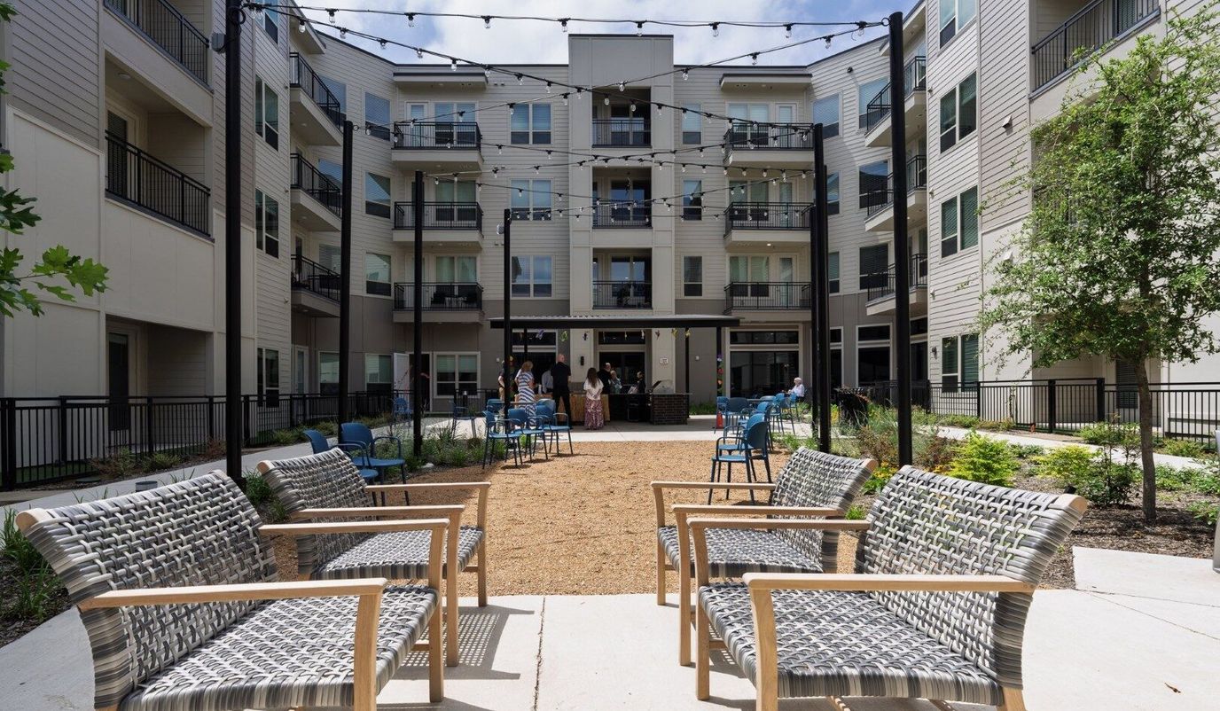Outdoor seating area at the facility with residents
