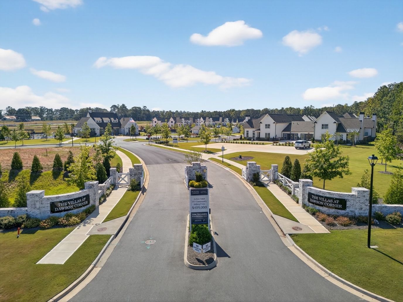Entrance of The Villas at Dawson Corner with landscaped grounds