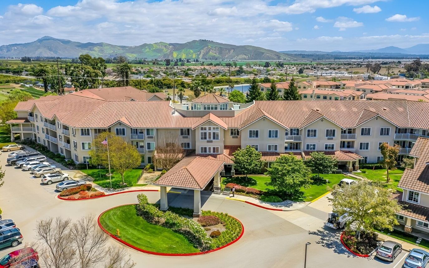 Aerial view of the facility with landscaped grounds