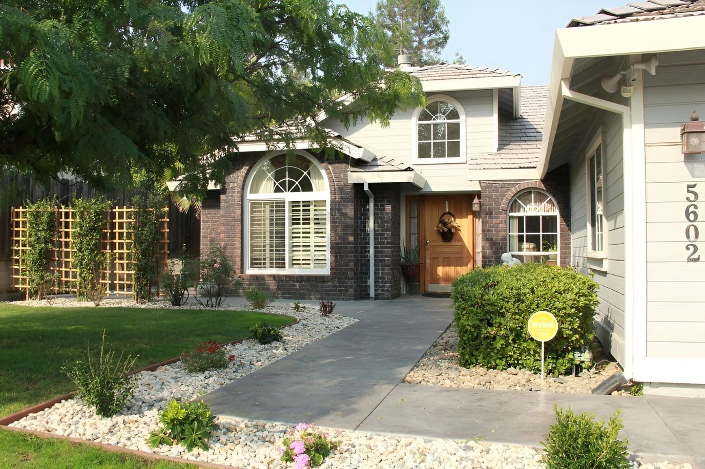 Exterior view of Montclair Villa with landscaping.