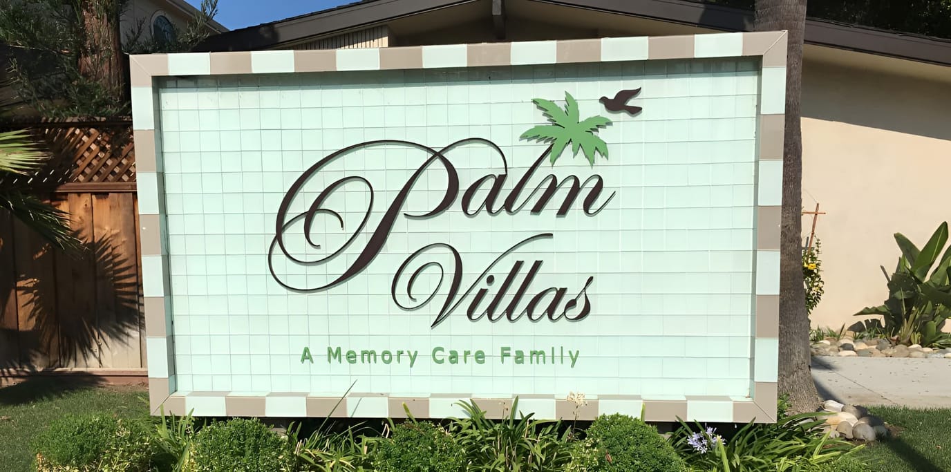 Sign of Palm Villas Memory Care facility
