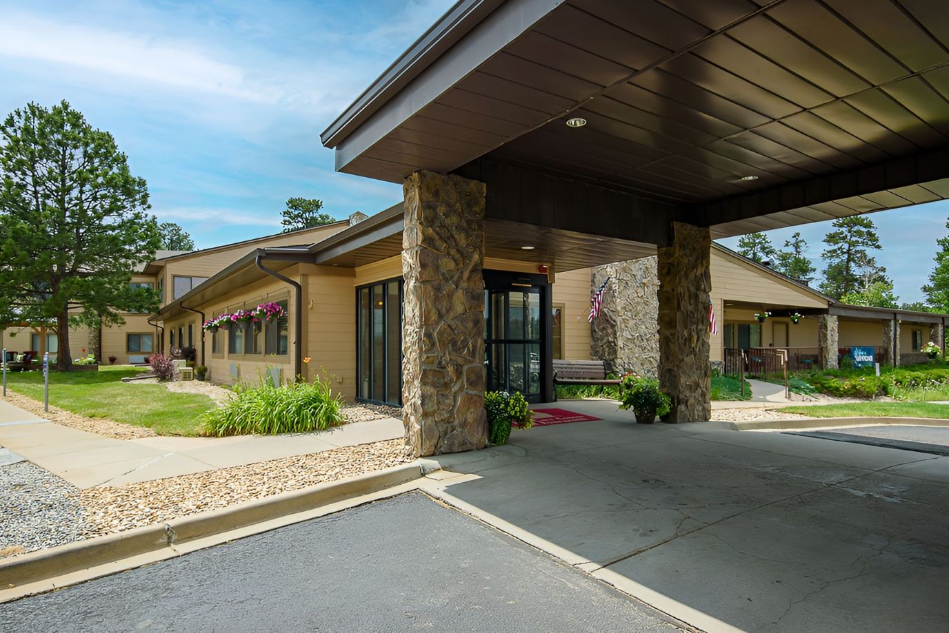 Exterior view of the entrance to a senior living facility
