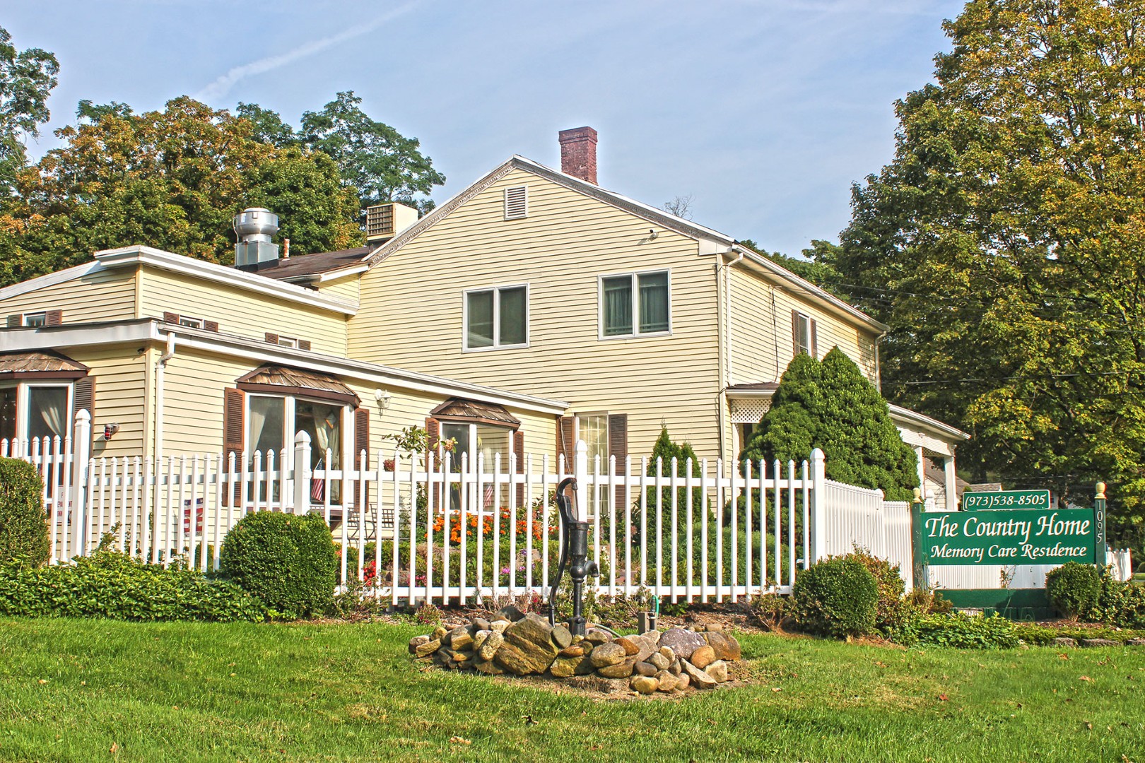 Exterior view of The Country Home facility with garden