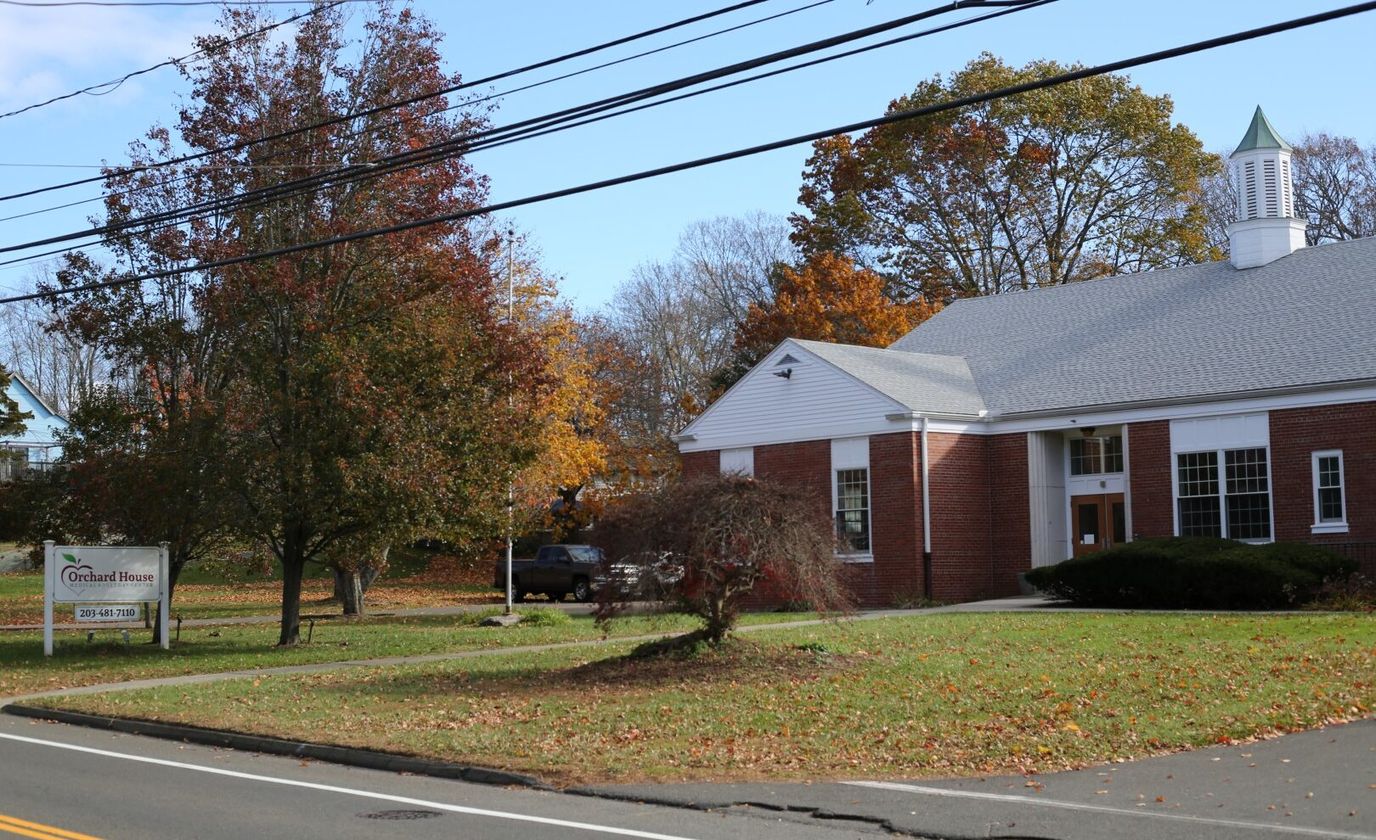 Outdoor view of Orchard House senior living facility