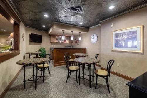 Cozy common area with tables and chairs