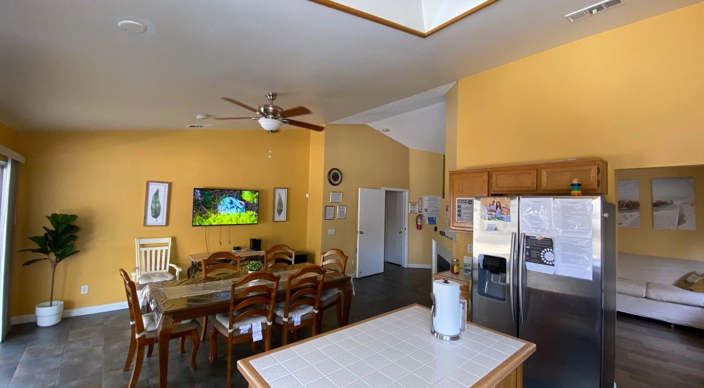 Interior view of a common area with dining table