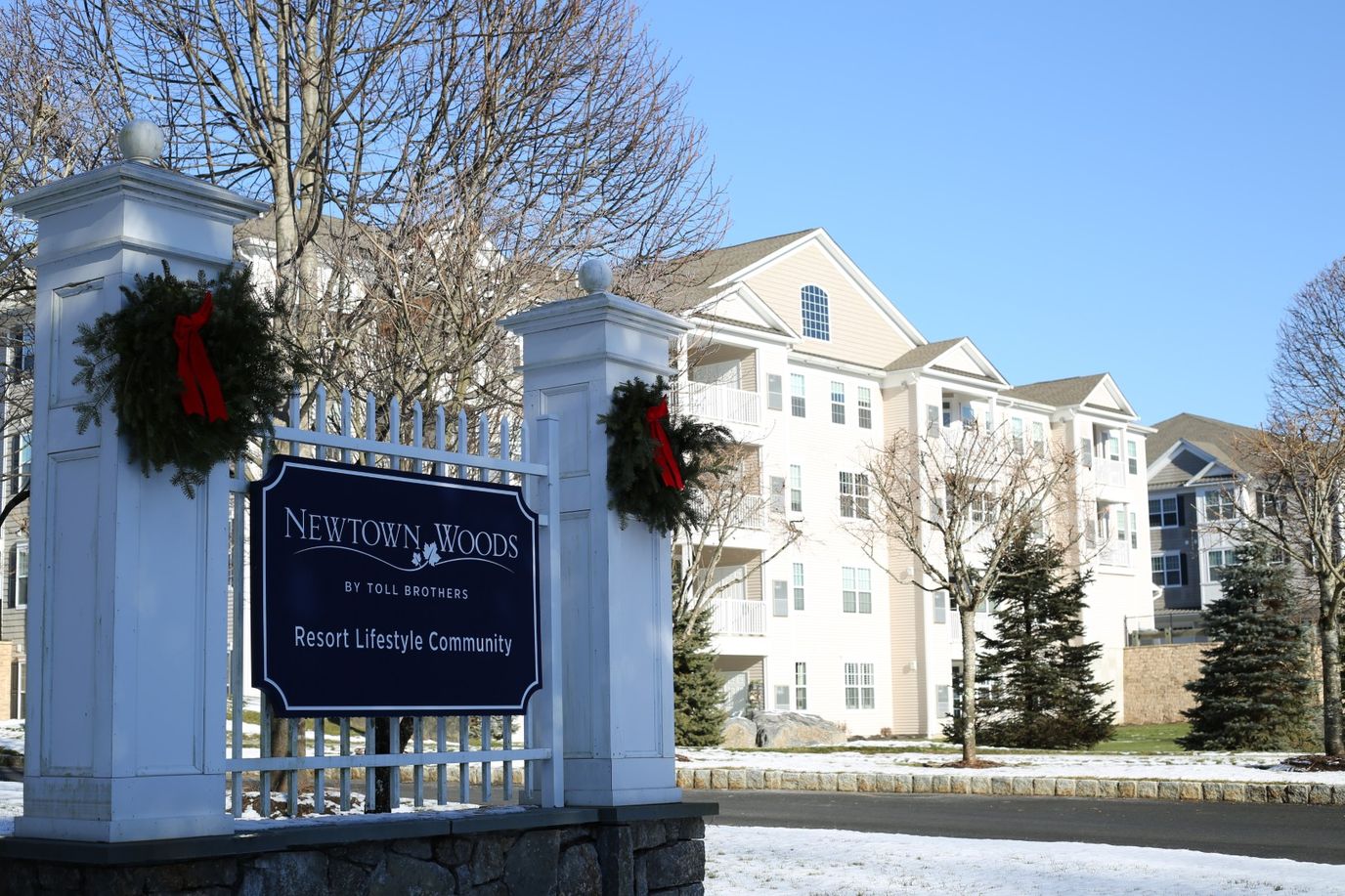Exterior view of Newtown Woods facility sign