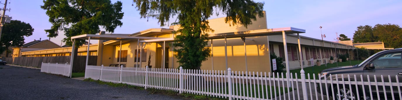 Exterior view of Waldon Health Care Center at sunset