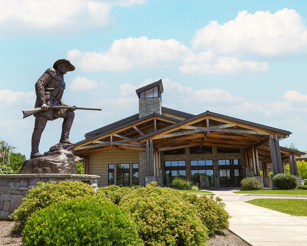 Exterior view of Boonespring Skilled Nursing Facility with landscaping