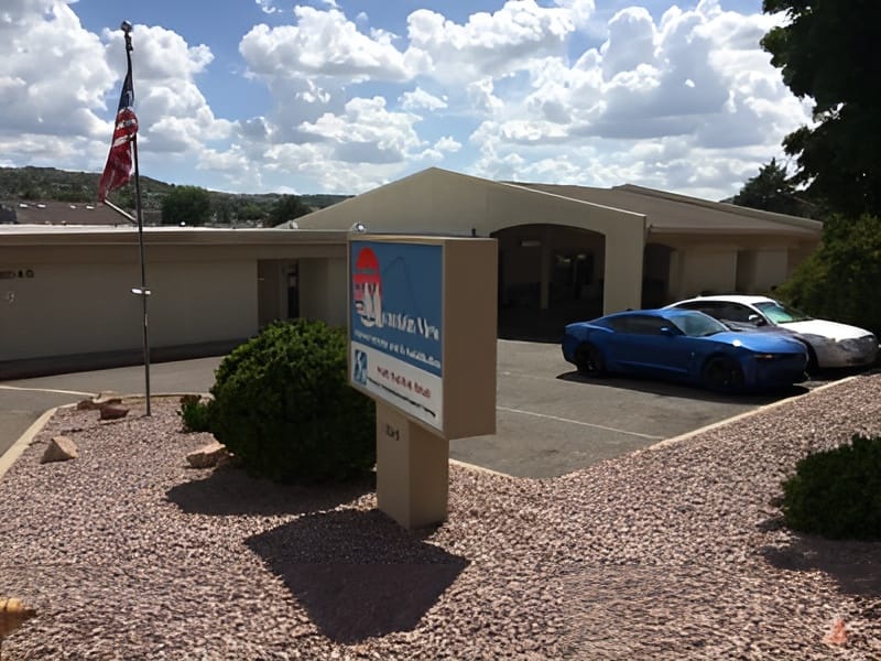 Exterior view of Mountain View Manor with parking area