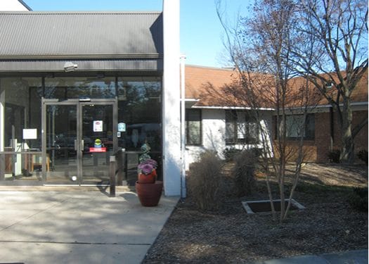 Front entrance of a nursing facility with outdoor space