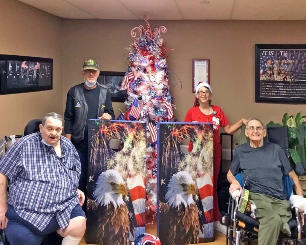 Residents and staff celebrate with patriotic decorations.