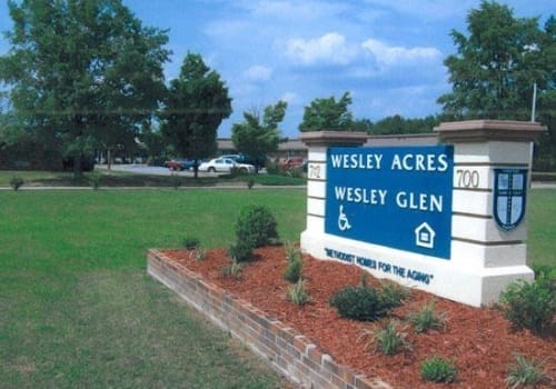 Exterior sign of Wesley Acres facility.