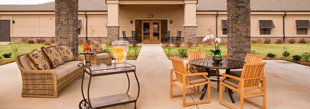 Outdoor seating area with tables and chairs
